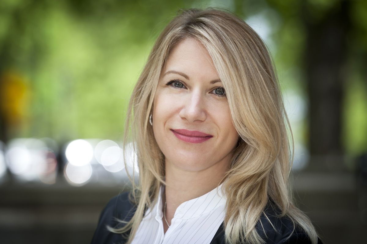 Close Up Of A mature Happy Blond Woman Smiling At The Camera. Thirties.